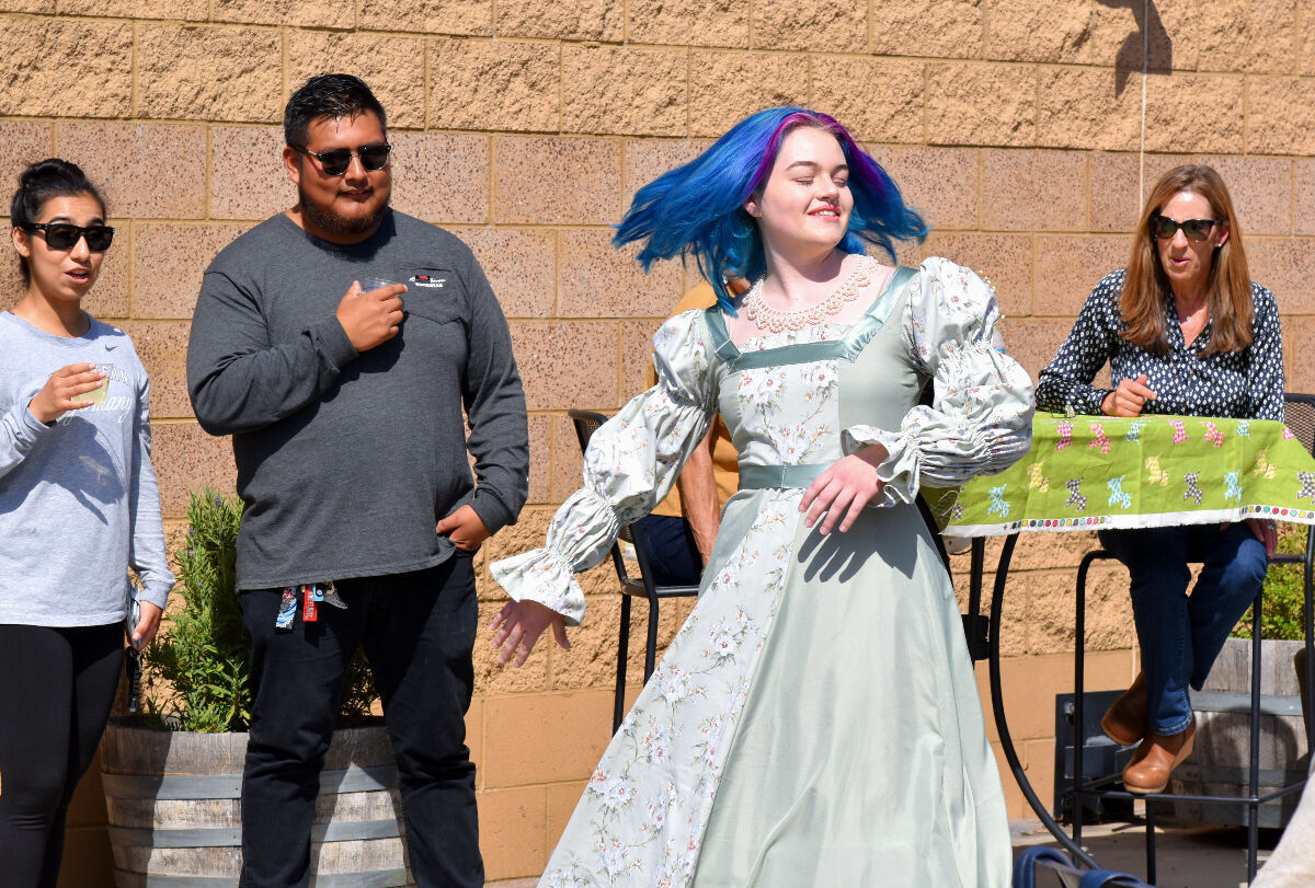 Fashion student Mariah shows off her 18th century style dress.